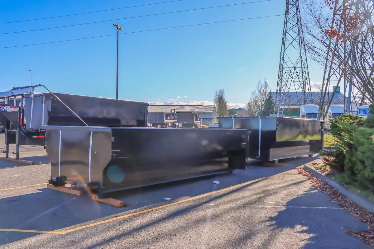 Roll-off dumpster ready for waste disposal at job site for Residential Dumpster Rental in Piney Green